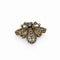 Broche Broche au design vintage, en or jaune, argent et diamants. 58 Facettes 50143