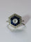 Bague 56 Bague Hexagonale Art Déco en or blanc, diamants et saphirs 58 Facettes 156