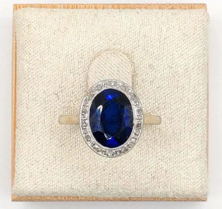 Bague 50.5 Bague Pompadour deux ors ornée d'une pierre bleue et de diamants 58 Facettes