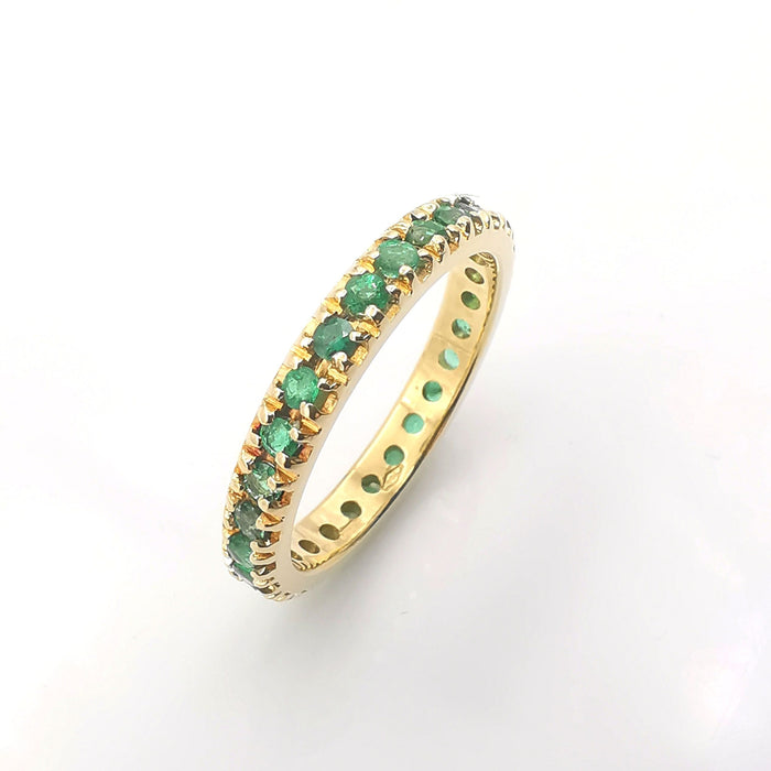 American gold and emerald wedding rings