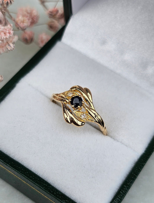 Yellow gold sapphire diamond ring