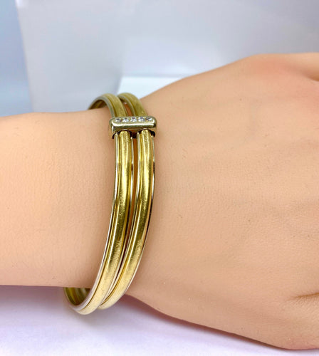 Bracelet Bracelet double joncs, or blanc, diamants, Yves Saint Laurent 58 Facettes AB601