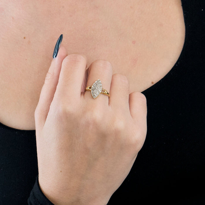 Yellow and white gold marquise ring with diamonds