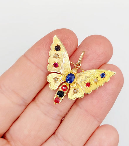 Pendentif Pendentif or rose papillon, pierres de couleur et perles 58 Facettes A05324