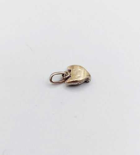 Pendentif Pendentif antique tête de renard en argent et or blanc 18k, diamants et rubis 58 Facettes A06570