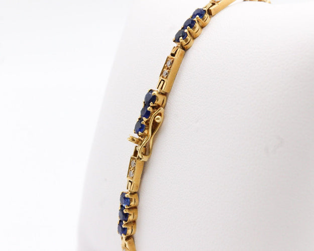 Bracelet Bracelet rivière de diamants et de saphirs, or jaune 58 Facettes 240045