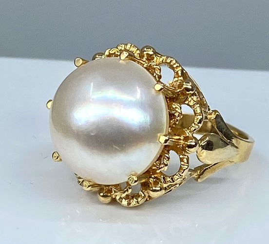 Bague 52 Bague et boucles d’oreilles en or jaune 18 carats et perles mabé. 58 Facettes AB309