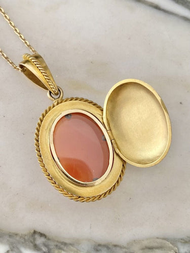 Pendentif Pendentif porte-photo en or jaune serti d'un camée en Agate 58 Facettes