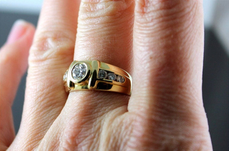 Bague 56 Bague Mixe Or jaune et Diamants (centre +/-0.55 Ct + 0.40 Ct Entourage) 58 Facettes