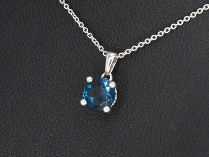 Pendentif Pendentif en or blanc avec topaze 58 Facettes 2331