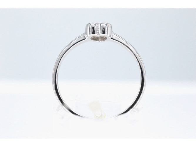 Bague Bague en or blanc avec un diamant taille brillant en forme de cœur 58 Facettes 2094