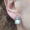 Boucles d'oreilles Boucles d'oreilles en or blanc avec perles et diamants 58 Facettes PE727