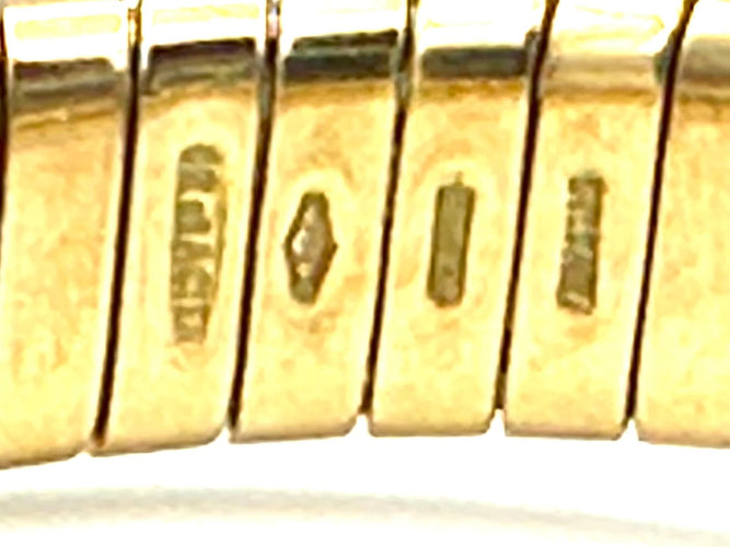 Bracelet BVLGARI. Collection "Tubogas", bracelet or jaune et onyx 58 Facettes