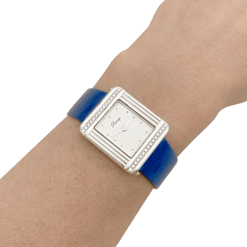 Montre Montre Poiray, "Ma Première",  acier et diamants sur cuir. 58 Facettes 34340