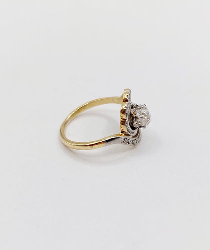 Bague 43 Bague tourbillon antique en or 18k et platine, diamant ancien 0,30 ct et roses 58 Facettes A06352