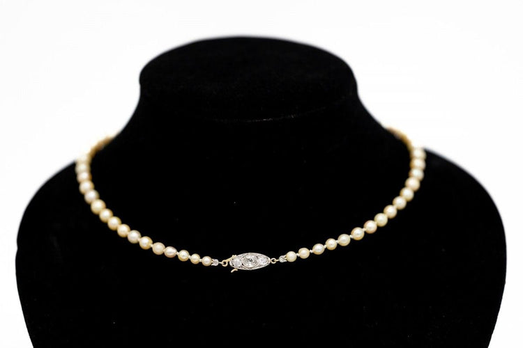 Collier Collier ancien en perles, fermoir en or jaune et platine et diamants 58 Facettes 10271