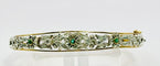 Bracelet Bracelet en or jaune orné de motifs floraux en argent, émeraudes et diamants 58 Facettes 50319