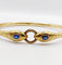 Bracelet Bracelet serpent à deux têtes or jaune et pierre bleues (circa 1920) 58 Facettes A06347