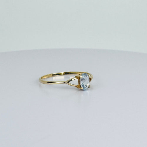 Bague 59.5 Bague en or jaune avec aigue-marine ovale naturelle bleu clair 58 Facettes 2508022