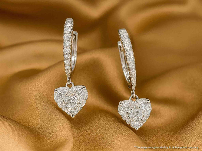 Boucles d'oreilles Boucles d'oreilles en or blanc serties de diamants en forme de cœur 58 Facettes 2174