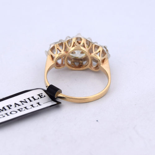 Bague 54 Bague ancienne en platine avec un diamant central de 1,20 ct et des diamants totalisant 1,00 ct 58 Facettes