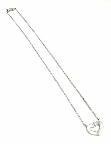 Collier CARTIER. Collection "Cœur et symbole", collier or blanc 18K 58 Facettes