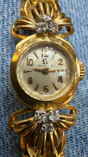 Montre Montre femme Omega vintage en or et diamants 58 Facettes