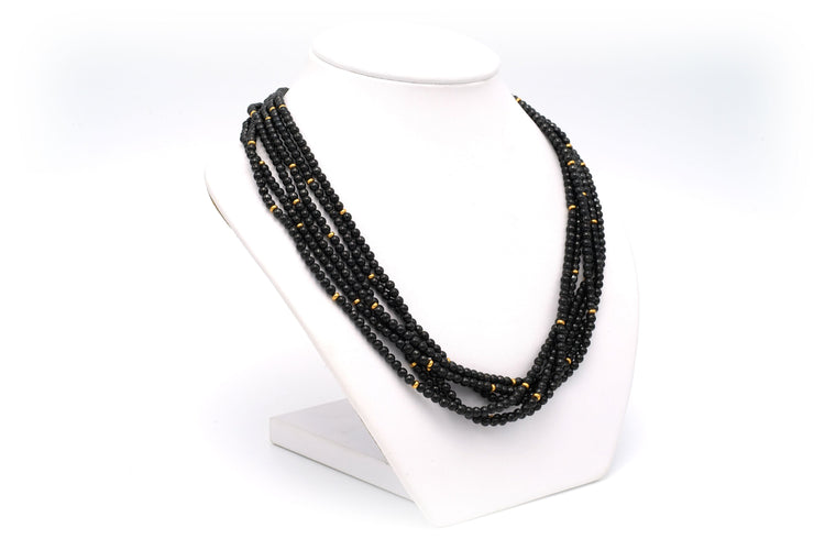 Collier Collier en perles d'hématite, diamants et or jaune 58 Facettes 13822
