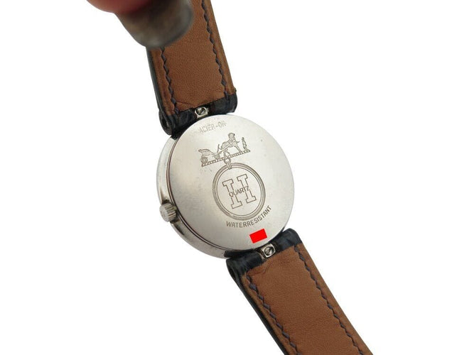 Montre vintage montre HERMES clipper 26 mm en or 18k et acier quartz  lady 58 Facettes 268714