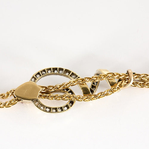 Collier Chaîne en or jaune et coulant Serpent en or gris et diamants et émeraude 58 Facettes SNA1712