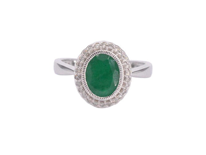 Bague 54 Bague entourage en or blanc avec diamants et émeraude 58 Facettes 2061