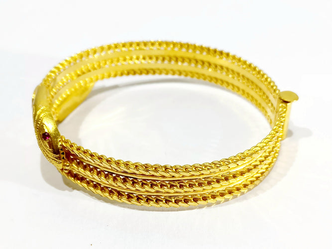 Bracelet Bracelet serpent or jaune et rubis 58 Facettes