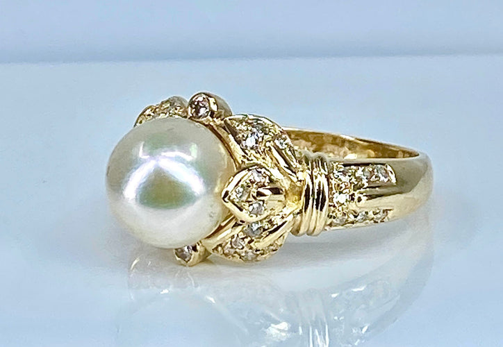 Bague 52 Bague en or jaune 18 carats, perle et 38 diamants 58 Facettes AB448