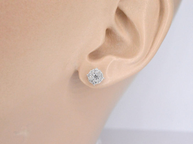 Boucles d'oreilles Boucles d'oreilles en or blanc avec diamants taille brillant 58 Facettes 2075