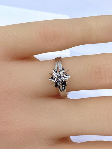 Bague Bague en or blanc 18 carats et diamant 58 Facettes AB387