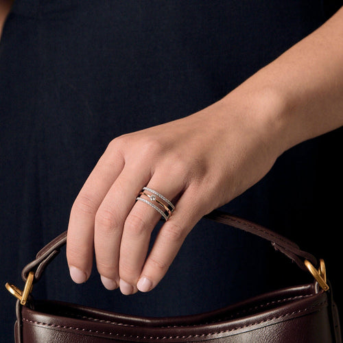 Three-ring ring in rose gold, white gold, and diamonds 