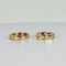 Boucles d'oreilles Boucles d’oreilles créoles avec rubis et diamants en or jaune 14k 58 Facettes 2512013