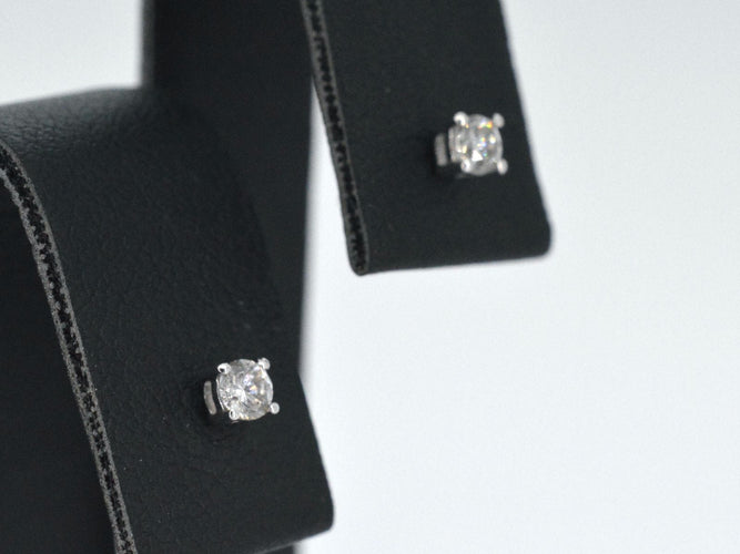 Boucles d'oreilles Boucles d'oreilles en or blanc serties de diamants 58 Facettes 2270