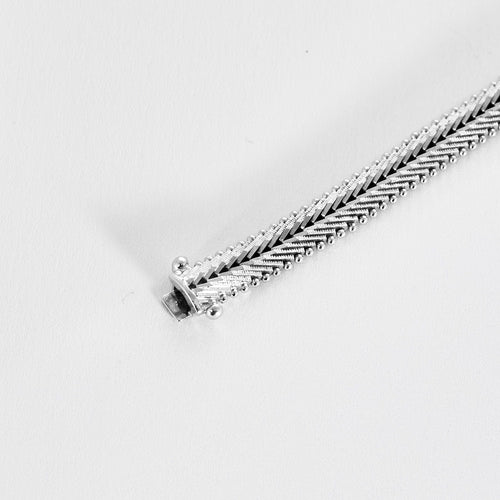 Bracelet Bracelet années 60, or blanc et diamants 58 Facettes GULK202