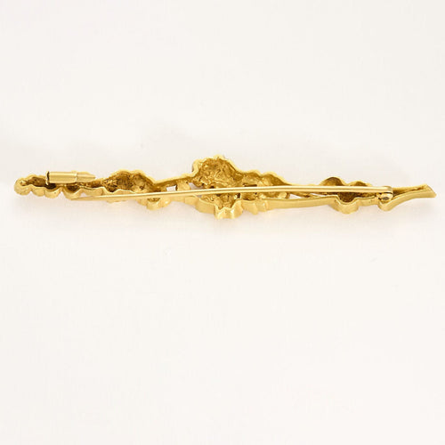 Broche Broche barrette à motif floral ajourée en or jaune 58 Facettes MAR0742