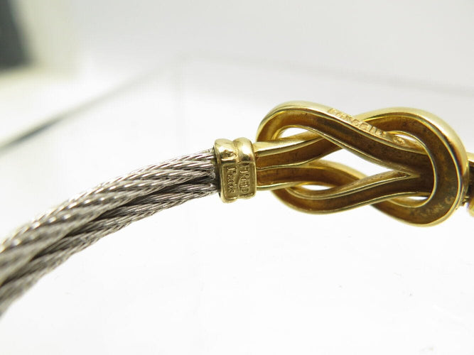 Bracelet vintage bracelet FRED force 10 infinie gm or jaune 18k acier t16.5 58 Facettes 271707