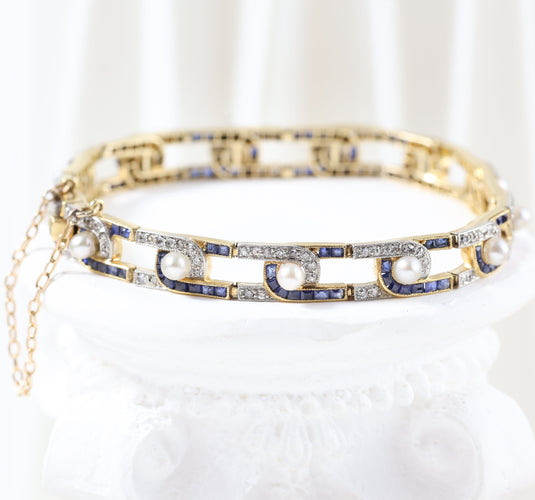 Bracelet Bracelet vintage orné de diamants, de saphirs et de perles 58 Facettes J010000311