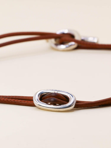 Collier HERMES Collier GLENAN argent cuir marron 58 Facettes 1206.9