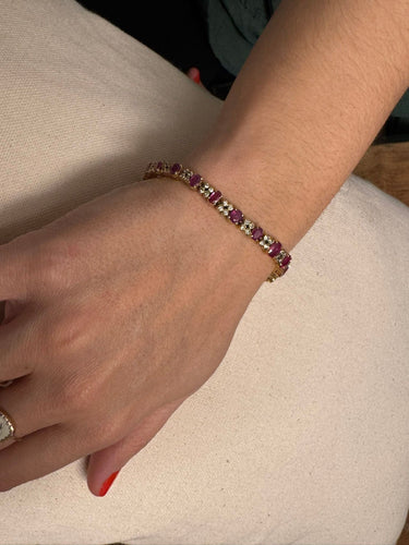 Pulsera de oro amarillo con diamantes rubí
