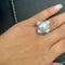 Bague 52 Bague en or blanc avec perle et diamants 58 Facettes