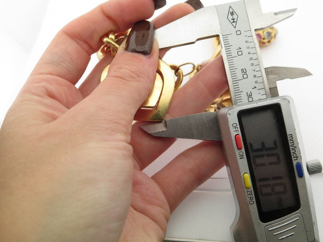 Bracelet bracelet gourmette breloques coeur zodiac t18 or jaune 18k 90.5gr charms 58 Facettes 270131