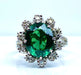 Bague 48 Bague or blanc, pierre verte et 10 diamants 58 Facettes AB426