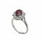 Bague 50 Bague marguerite en or blanc 18 carats, rubis et diamants 58 Facettes