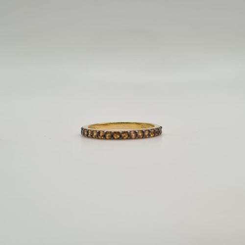 Bague 54 Demi-alliance or jaune 18 carats sertie de saphirs oranges 58 Facettes