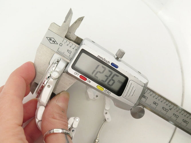 Montre montre CHANEL j12 h3404 automatique moonphase ceramique blanche 58 Facettes 271323